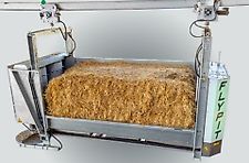 Automatischer Einstreuroboter für Qaderballen